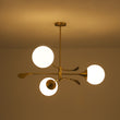 Load image into Gallery viewer, Wind-Vane Tiered 3-Light Opal Glass Globe Sputnik Chandelier