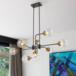 Load image into Gallery viewer, LightFixturesUSA - Soda Pop 8 - Light Seeded Glass Bubble Sputnik Linear Chandelier - Chandelier - Black + Brass -