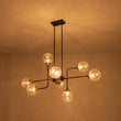 Load image into Gallery viewer, LightFixturesUSA - Soda Pop 8 - Light Seeded Glass Bubble Sputnik Linear Chandelier - Chandelier - Black + Brass -