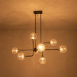 Load image into Gallery viewer, LightFixturesUSA - Soda Pop 8 - Light Seeded Glass Bubble Sputnik Linear Chandelier - Chandelier - Black + Brass -