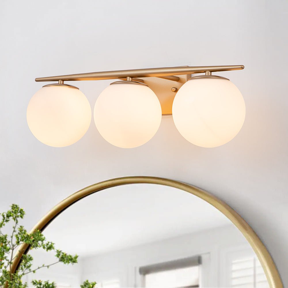 black and gold globe vanity light