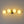 4-Light Brass Tiered Opal Glass Globe Linear Vanity Wall Sconce