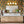 4-Light Brass Tiered Opal Glass Globe Linear Vanity Wall Sconce