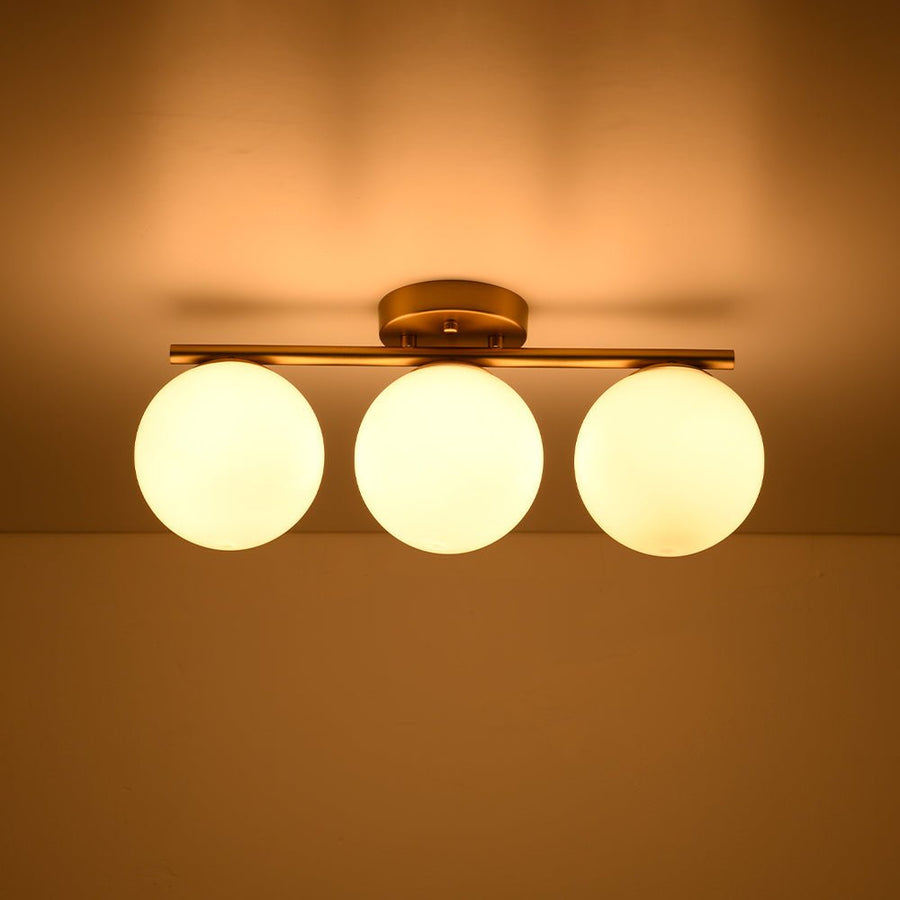 LightFixturesUSA - 3 - Light Shine Opal Glass Globe Linear Semi Flush Mount - Ceiling Light - Brass - 