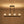 Load image into Gallery viewer, LightFixturesUSA - 8 - Light Seeded Glass Black Brass Linear Island Chandelier - Chandelier - Black + Brass - 
