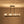 Load image into Gallery viewer, LightFixturesUSA - 8 - Light Seeded Glass Black Brass Linear Island Chandelier - Chandelier - Black + Brass - 
